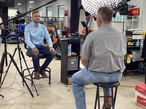 Video production team filming on location in Katy, Texas